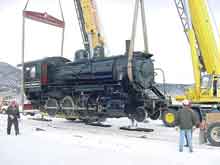 Crane lifting NN loco No. 93 